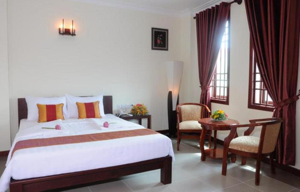 V N E Hotel Phnompen Szoba fotó